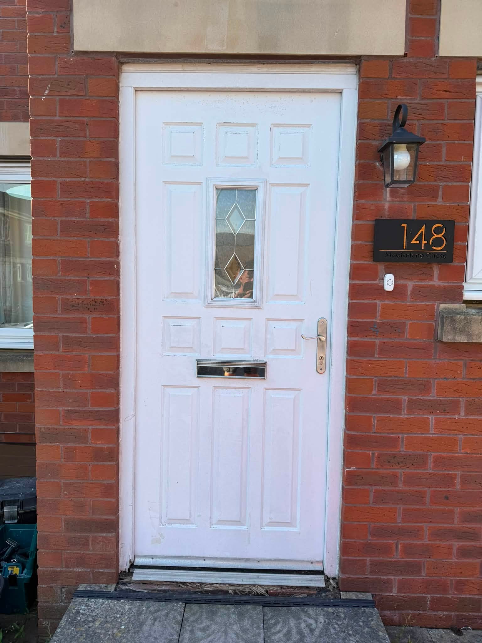 Existing front door before replacement